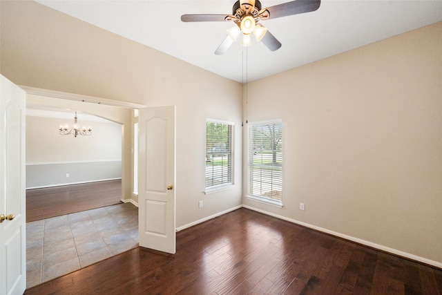 15331 Springhill Bend Ln, Cypress, TX 77429 - empty room featuring a chandelier, wood finished floors, and a ceiling fan
