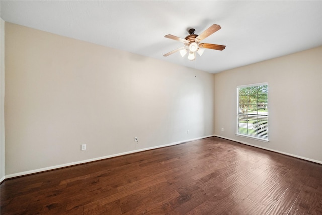 15331 Springhill Bend Ln, Cypress, TX 77429 - unfurnished room featuring dark wood finished floors and a ceiling fan