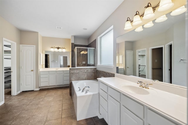 15331 Springhill Bend Ln, Cypress, TX 77429 - full bath with a stall shower, a garden tub, and two vanities