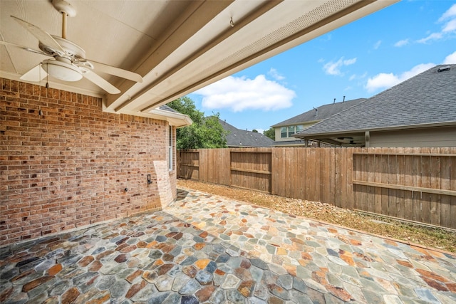 15331 Springhill Bend Ln, Cypress, TX 77429 - fenced backyard with ceiling fan and a patio