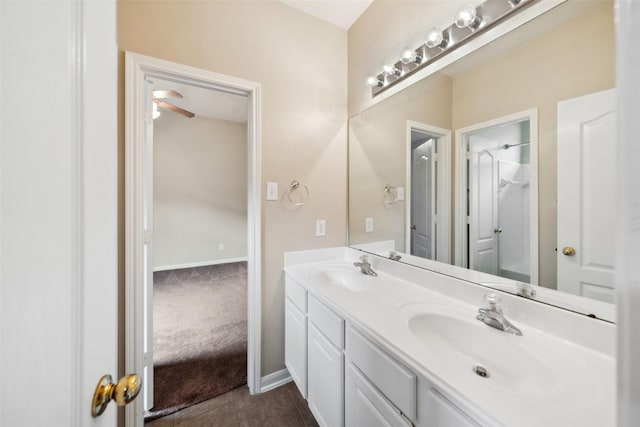 15331 Springhill Bend Ln, Cypress, TX 77429 - full bathroom with double vanity, a shower, ceiling fan, and tile patterned flooring