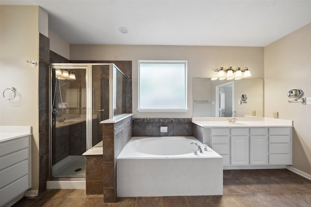 15331 Springhill Bend Ln, Cypress, TX 77429 - bathroom featuring vanity, a garden tub, a shower stall, and tile patterned floors