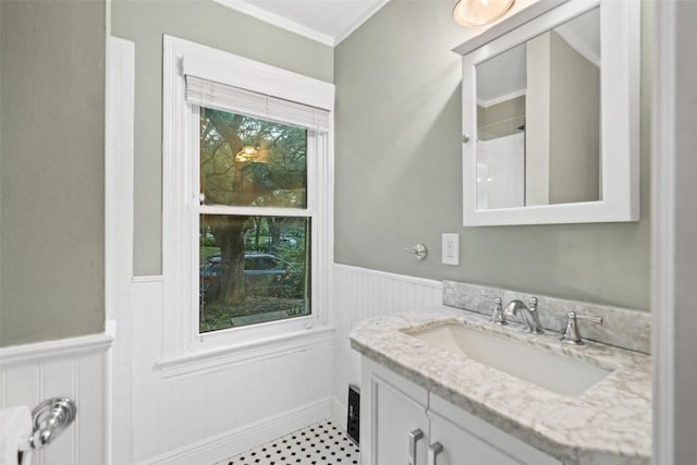 1621 Cherryhurst St, Houston, TX 77006 - bathroom with wainscoting, vanity, and ornamental molding