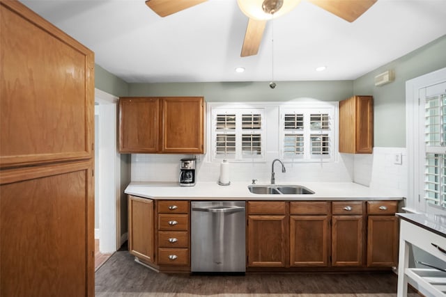 1621 Cherryhurst St, Houston, TX 77006 - kitchen featuring stainless steel dishwasher, dark wood-type flooring, ceiling fan, tasteful backsplash, and light countertops
