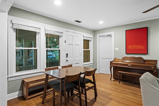 1621 Cherryhurst St, Houston, TX 77006 - dining room featuring light wood-style floors, recessed lighting, ornamental molding, and ceiling fan