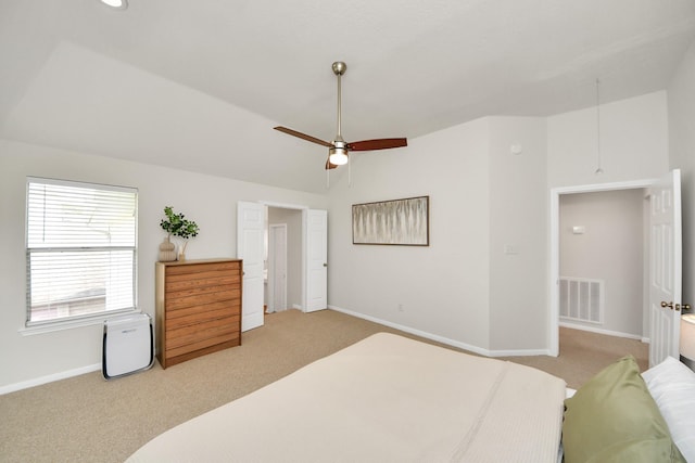 235 Cedar Elm Ln, Sugar Land, TX 77479 - bedroom featuring light colored carpet, vaulted ceiling, and ceiling fan