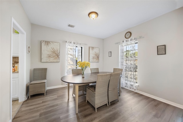 3825 Redbud Dr, La Porte, TX 77571 - dining area with wood finished floors and baseboards