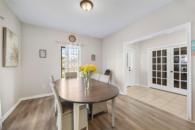 3825 Redbud Dr, La Porte, TX 77571 - dining space with french doors and wood finished floors