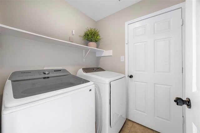 3825 Redbud Dr, La Porte, TX 77571 - washroom featuring separate washer and dryer and light tile patterned floors