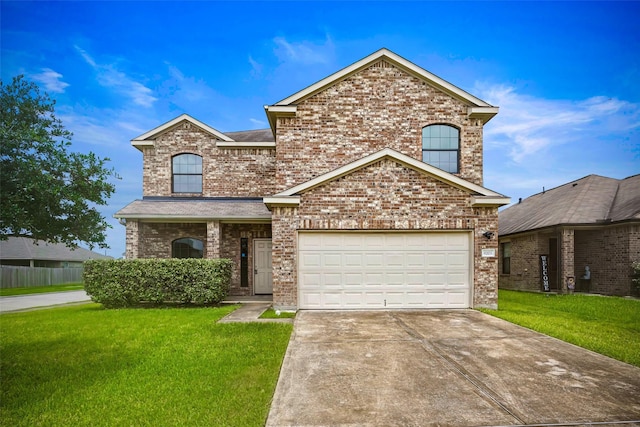 9203 Sasson Blvd, Houston, TX 77044 - traditional home featuring a front yard, driveway, brick siding, and a garage