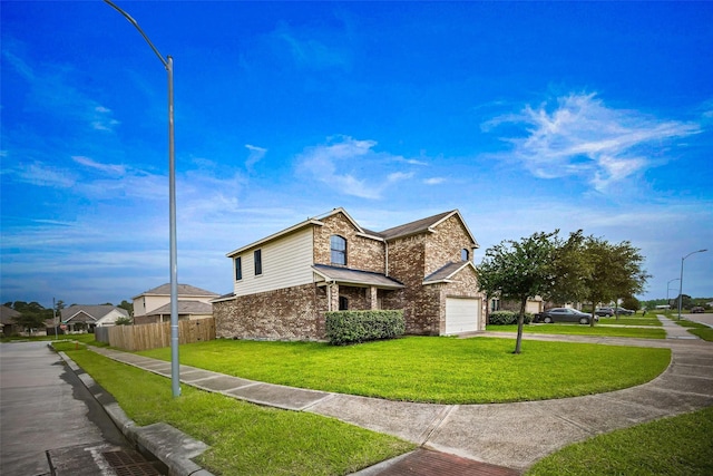 9203 Sasson Blvd, Houston, TX 77044 - view of side of property featuring brick siding, driveway, and an attached garage
