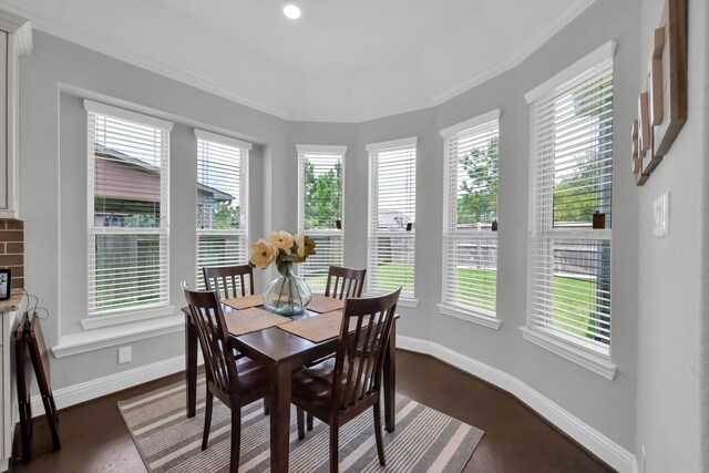 31268 New Forest Park Ln, Spring, TX 77386 - dining area featuring dark wood-style floors and ornamental molding