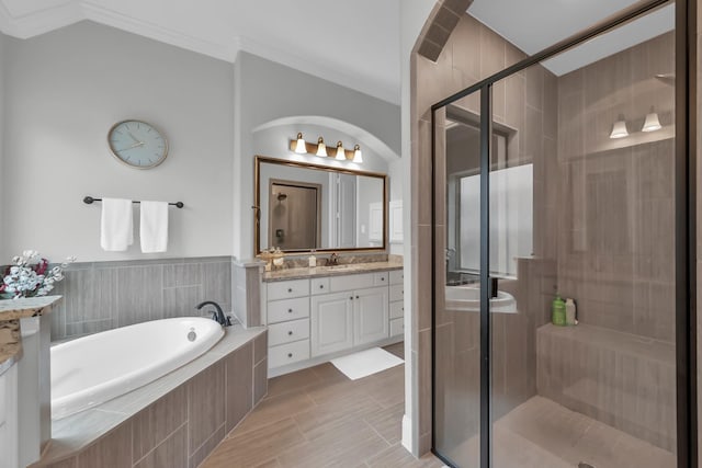 31268 New Forest Park Ln, Spring, TX 77386 - bathroom with vanity, a bath, crown molding, and a shower stall