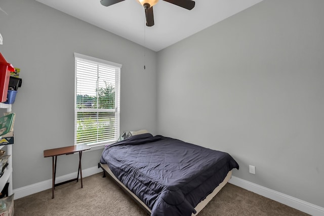 31268 New Forest Park Ln, Spring, TX 77386 - carpeted bedroom with multiple windows and a ceiling fan