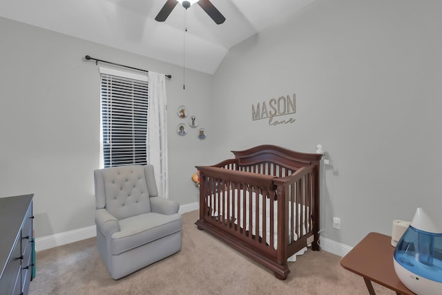 31268 New Forest Park Ln, Spring, TX 77386 - bedroom featuring a nursery area, vaulted ceiling, light colored carpet, and a ceiling fan