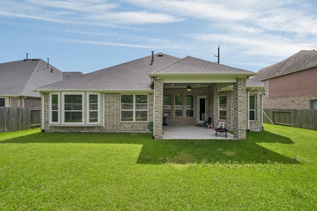 31268 New Forest Park Ln, Spring, TX 77386 - back of house featuring a ceiling fan, a fenced backyard, brick siding, and a patio area