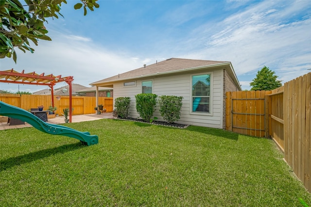 5830 Acacia Rose Ct, Richmond, TX 77407 - fenced backyard with a playground and a patio