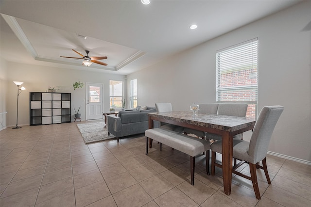 5830 Acacia Rose Ct, Richmond, TX 77407 - dining space with a ceiling fan, light tile patterned flooring, a raised ceiling, and recessed lighting