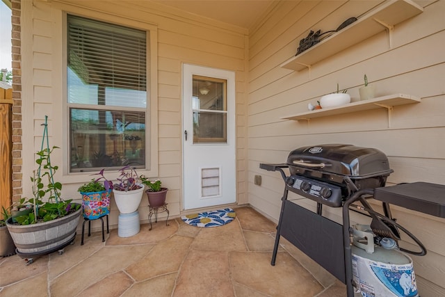 5830 Acacia Rose Ct, Richmond, TX 77407 - doorway to property featuring a patio