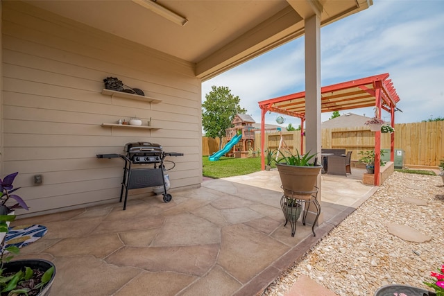 5830 Acacia Rose Ct, Richmond, TX 77407 - fenced backyard featuring a patio area and a playground
