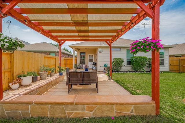 5830 Acacia Rose Ct, Richmond, TX 77407 - fenced backyard featuring a pergola, a patio, and outdoor lounge area