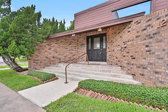 12 E Dansby Dr, Galveston, TX 77551 - entrance to property featuring brick siding