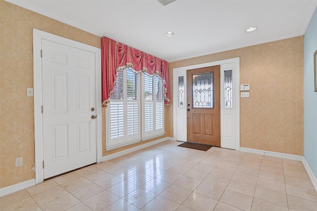12 E Dansby Dr, Galveston, TX 77551 - entrance foyer featuring wallpapered walls, ornamental molding, and light tile patterned floors