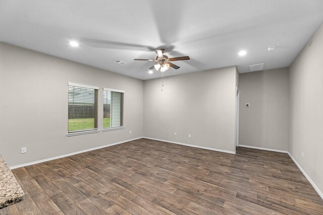 2431 Sutton Hollow Ct, Spring, TX 77373 - spare room featuring a ceiling fan, dark wood-type flooring, and recessed lighting