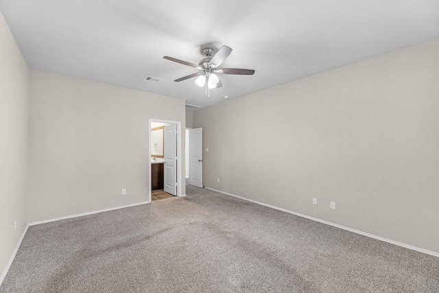 2431 Sutton Hollow Ct, Spring, TX 77373 - unfurnished bedroom featuring light carpet, a ceiling fan, and ensuite bathroom