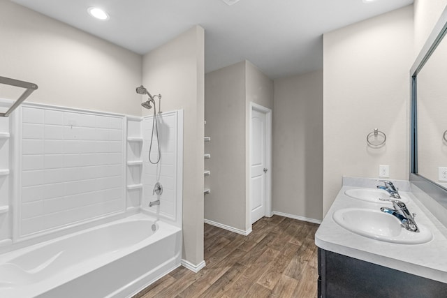 2431 Sutton Hollow Ct, Spring, TX 77373 - full bath featuring wood finished floors, shower / washtub combination, double vanity, and recessed lighting