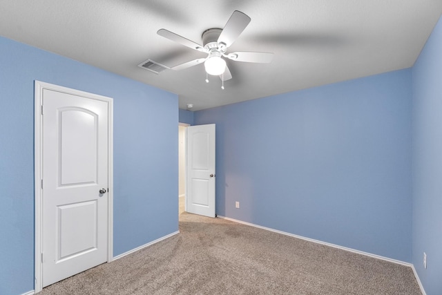 2431 Sutton Hollow Ct, Spring, TX 77373 - unfurnished bedroom featuring carpet and a ceiling fan