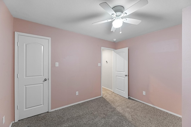 2431 Sutton Hollow Ct, Spring, TX 77373 - unfurnished bedroom with carpet and a ceiling fan
