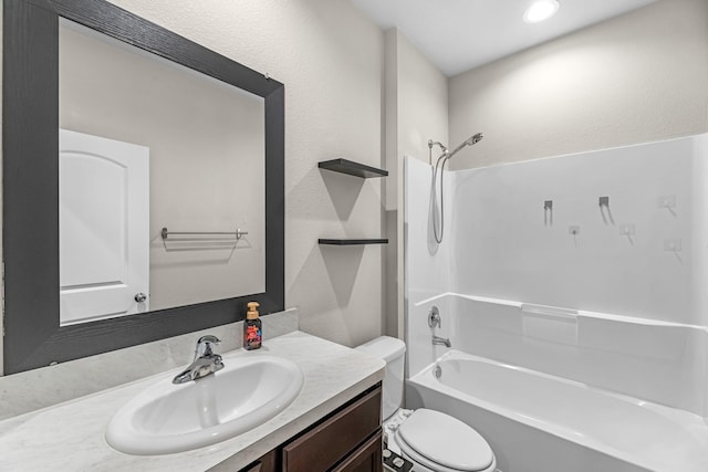 2431 Sutton Hollow Ct, Spring, TX 77373 - full bathroom featuring vanity, washtub / shower combination, and a textured wall