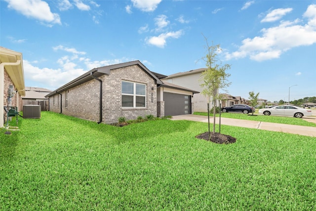7002 Halifax Harvest Ln, Richmond, TX 77407 - view of front of home featuring brick siding, driveway, a garage, and a front yard