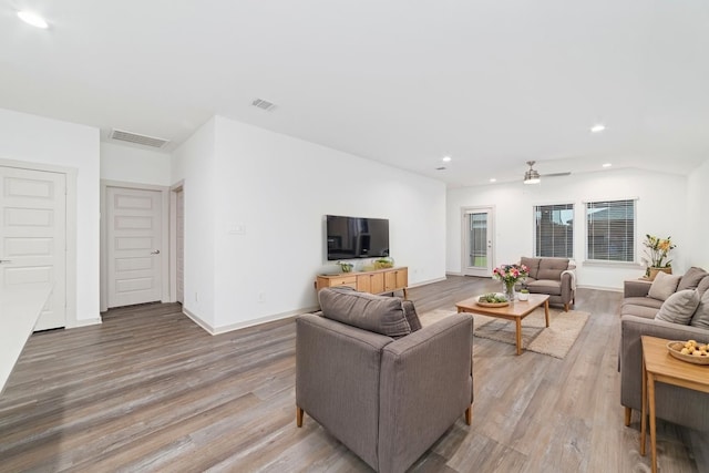 7002 Halifax Harvest Ln, Richmond, TX 77407 - living area with recessed lighting, light wood-style flooring, and ceiling fan