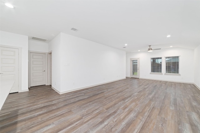 7002 Halifax Harvest Ln, Richmond, TX 77407 - unfurnished living room with recessed lighting, light wood-style flooring, and a ceiling fan