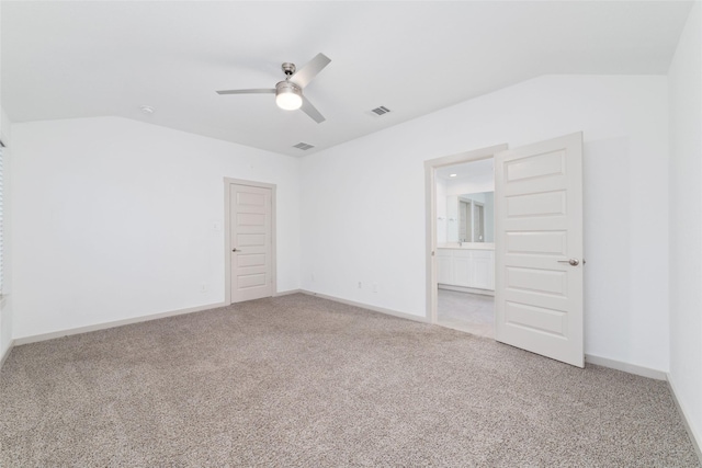 7002 Halifax Harvest Ln, Richmond, TX 77407 - unfurnished bedroom featuring carpet, vaulted ceiling, ensuite bath, and a ceiling fan