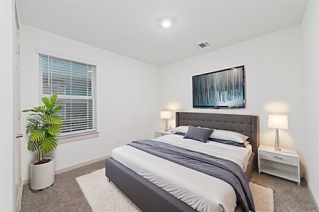 7002 Halifax Harvest Ln, Richmond, TX 77407 - bedroom featuring carpet and baseboards