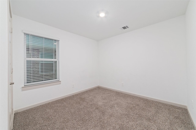 7002 Halifax Harvest Ln, Richmond, TX 77407 - empty room featuring carpet flooring and baseboards