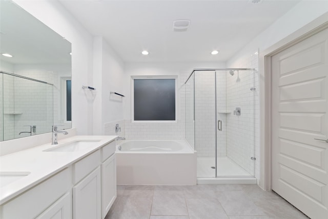 7002 Halifax Harvest Ln, Richmond, TX 77407 - full bathroom featuring a bath, a shower stall, double vanity, tile patterned flooring, and recessed lighting