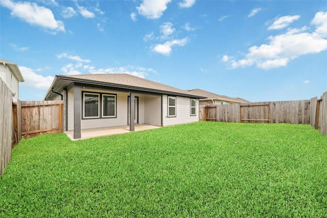 7002 Halifax Harvest Ln, Richmond, TX 77407 - rear view of house with a patio area and a fenced backyard