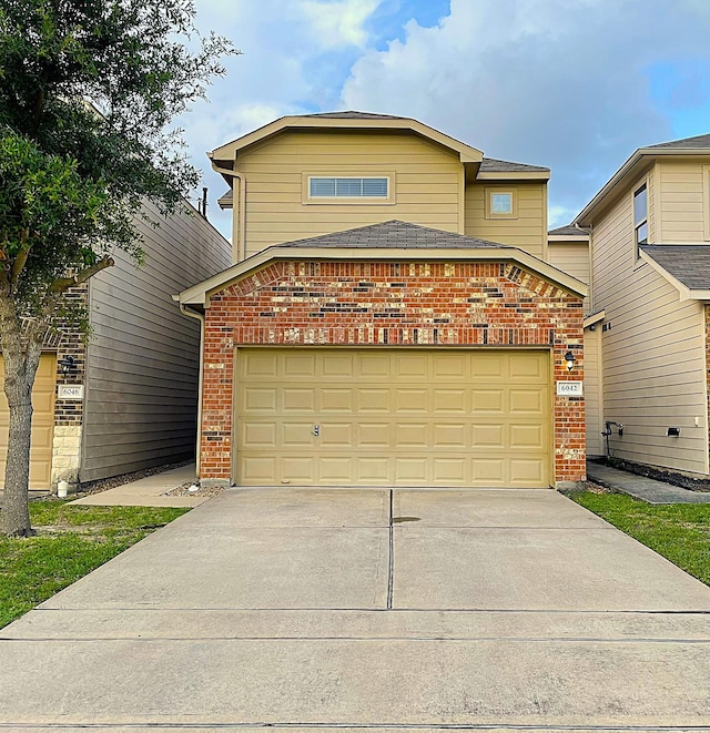 6042 Wesley Manor Ct, Katy, TX 77449 - traditional-style home featuring brick siding and driveway