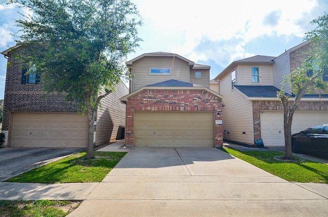 6042 Wesley Manor Ct, Katy, TX 77449 - view of front of property with brick siding, driveway, and a garage