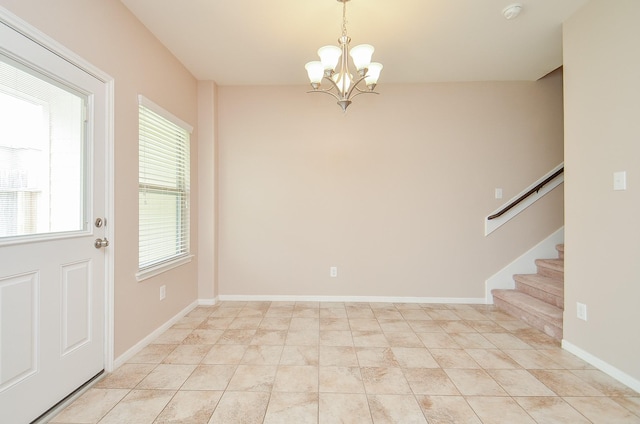 6042 Wesley Manor Ct, Katy, TX 77449 - foyer entrance with a chandelier and stairway
