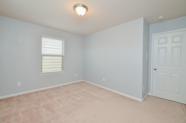 6042 Wesley Manor Ct, Katy, TX 77449 - spare room featuring light colored carpet and a smoke detector