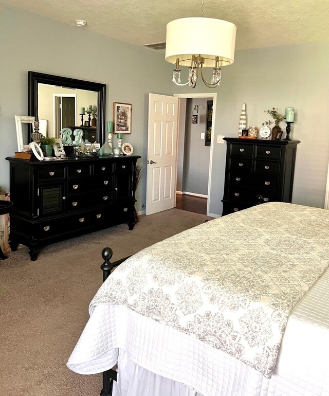 20809 Langworth Pl, Porter, TX 77365 - carpeted bedroom with a chandelier