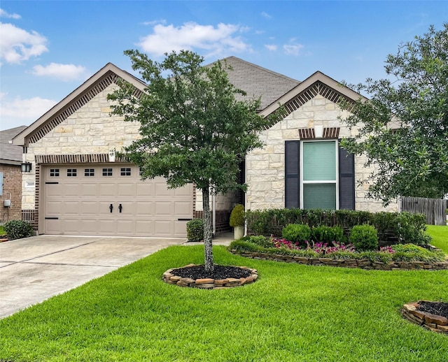 20809 Langworth Pl, Porter, TX 77365 - french country home with stone siding, concrete driveway, a front lawn, and a garage