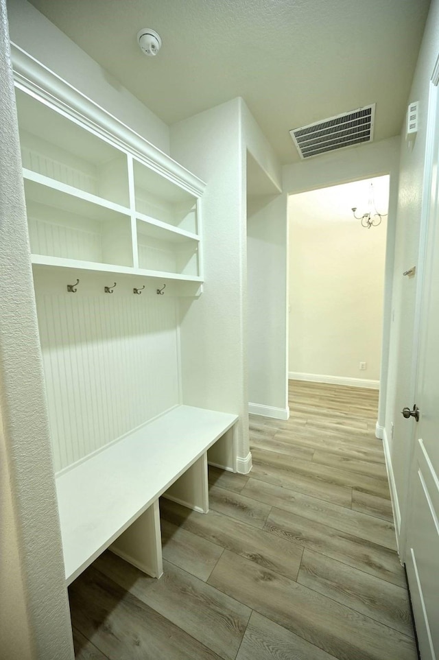 9002 Lacombe Ln, Tomball, TX 77375 - mudroom with wood finished floors and baseboards
