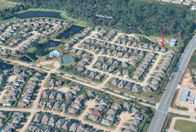 9002 Lacombe Ln, Tomball, TX 77375 - aerial view of property's location with nearby suburban area