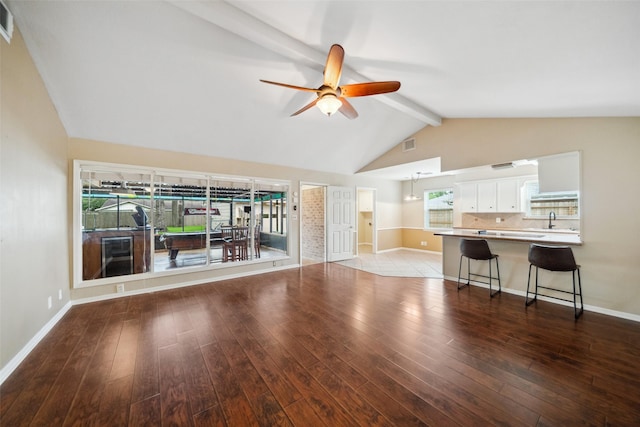 4117 Tilson Ln, Houston, TX 77080 - unfurnished living room with ceiling fan, wood finished floors, and healthy amount of natural light